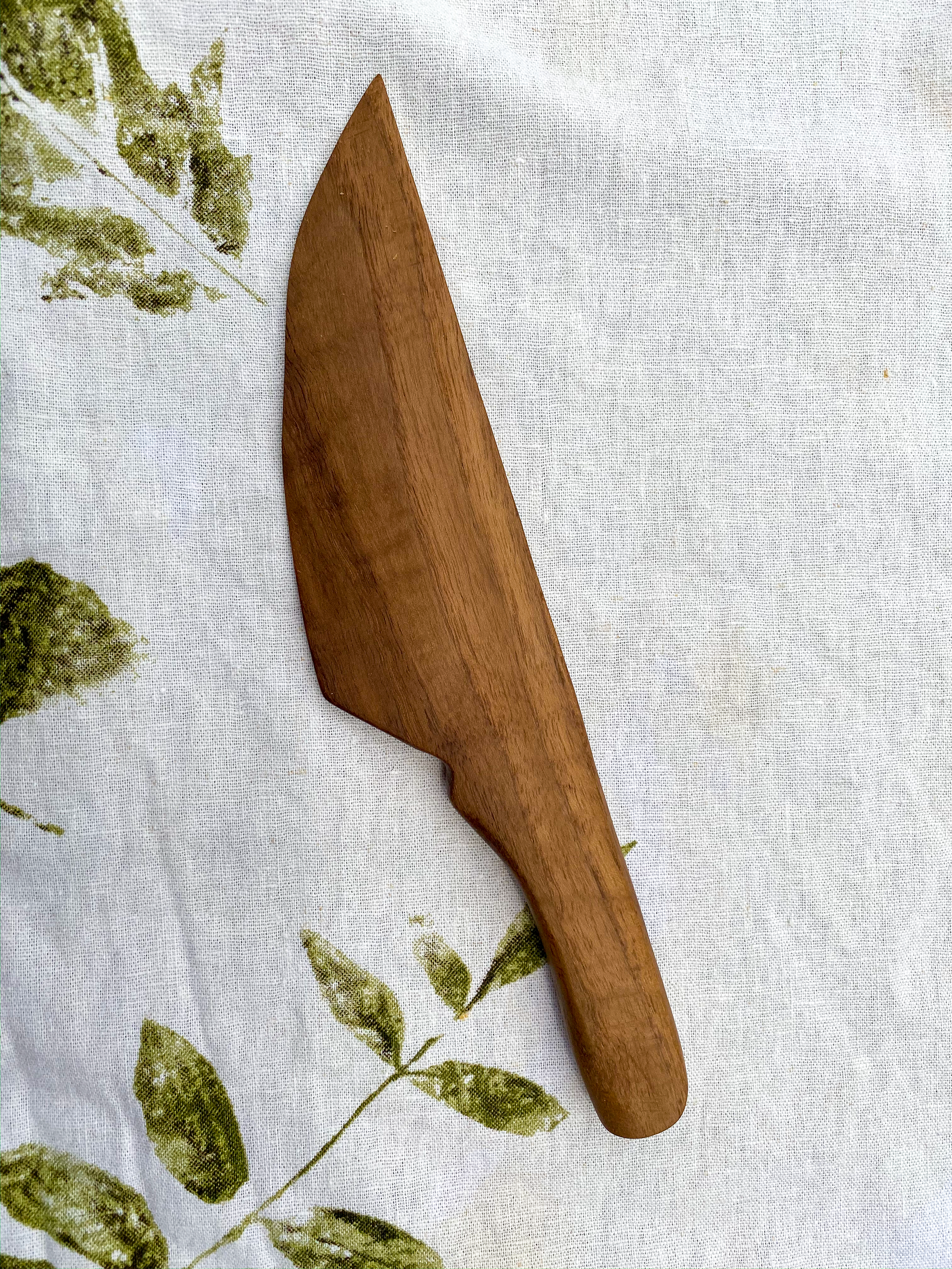 Hand carved 9" x 2" walnut cheese knife.