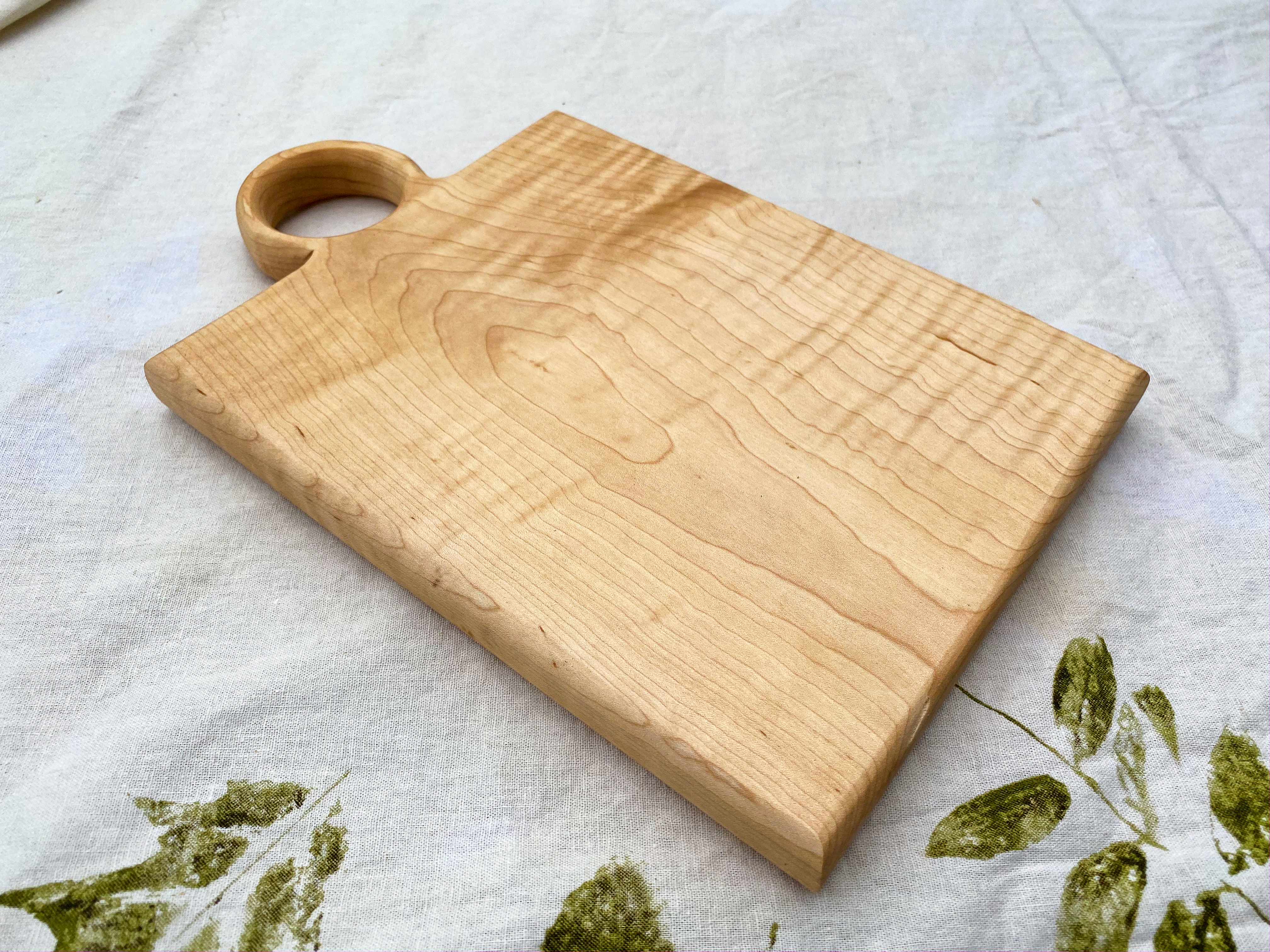 Handmade 13" x 8" curley maple wooden square cheese board.